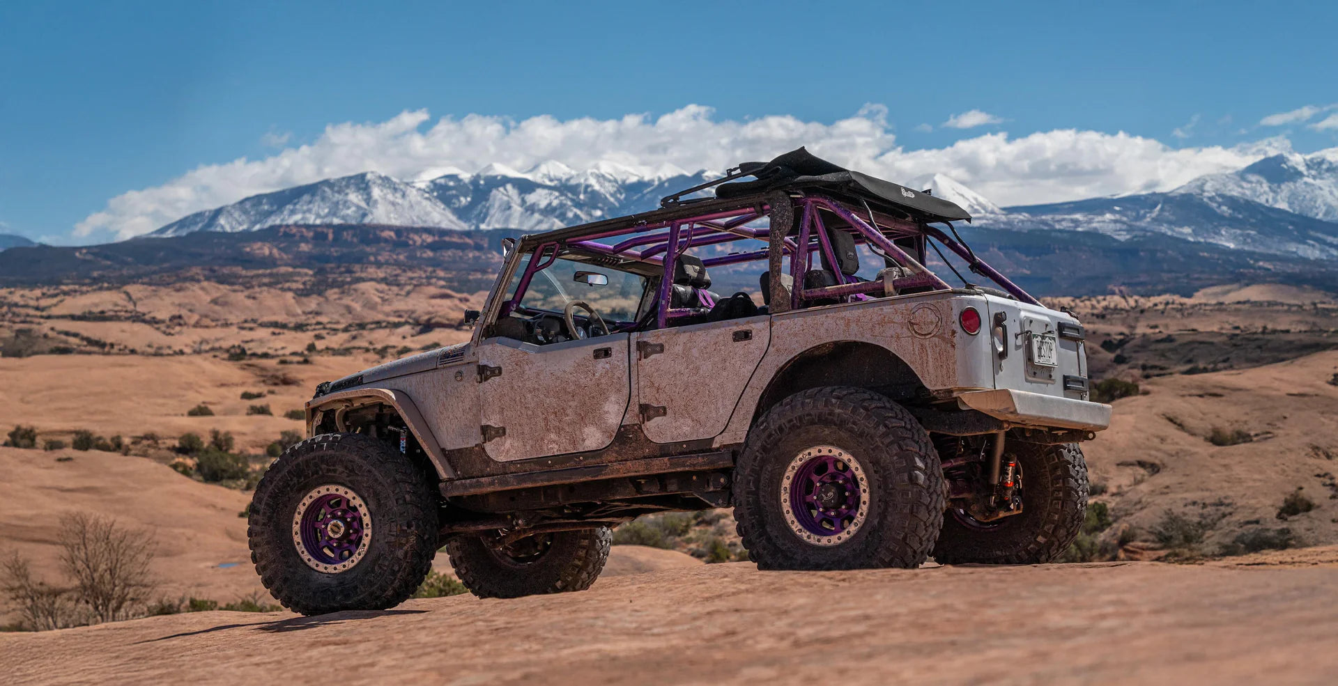 Jeep Wrangler JK 4‑Door outfitted with premium soft top and off‑road ready accessories on rugged trail